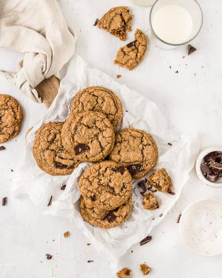 Vegan and gluten-free chocolate chunk cookies on a cutting board